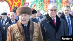 Первый президент Казахстана Нурсултан Назарбаев (слева) и вступивший в должность президента после сложения Назарбаевым полномочий Касым-Жомарт Токаев, бывший спикер сената парламента. Астана, 21 марта 2019 года.