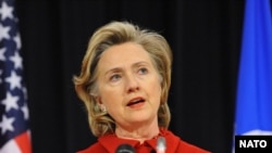 U.S. Secretary of State Hillary Clinton speaks at NATO headquarters in Brussels on December 4