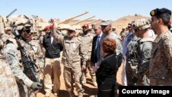 U.S. troops and officials are shown during a previous deployment to Saudi Arabia (file photo).