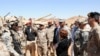 A Saudi general thanks U.S. Soldiers for their professional display during the opening ceremony for Friendship and Ironhawk III, at the Northwest Tactical Training Center. File photo