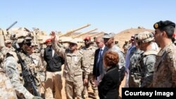 Gen. Saied Al Ghamdie, center left, northwest area deputy commanding general, Royal Saudi Land Forces, thanks U.S. Soldiers for their professional display during the opening ceremony for Friendship and Ironhawk III, at the Northwest Tactical Training Cent