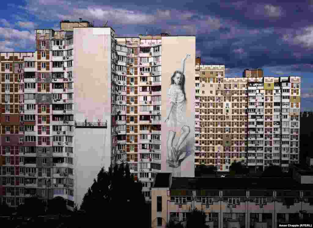 A Sasha Korban piece in progress, photographed on August 16. A resident of the northern suburb said of the project, "It's great. For years we've had nothing to look at but concrete." 