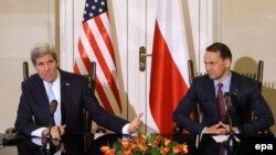 Джон Кэры і радаслаў Сікорскі