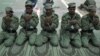 Cadets from the Afghan Local Police pray at the police academy on the outskirts of Jalalabad on June 20.