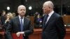 British Foreign Secretary William Hague (left) talks to Dutch Foreign Minister Uri Rosenthal at the start of a EU foreign ministers meeting at the EU Council headquarters in Brussels.