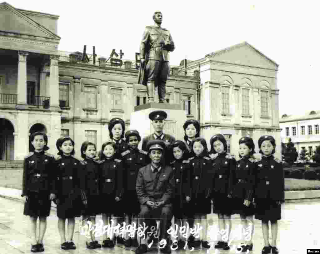 Macias (6th from left) poses with her schoolmates at graduation from the Mangyongdae Revolutionary School's primary school in Pyongyang in 1981.