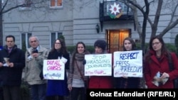 People rally in support of jailed journalist Khadija Ismayilova in front of Azerbaijani Embassy in Washington on December 8.