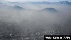 An aerial view shows the Afghan capital, Kabul, blanketed with heavy smog on January 6.
