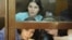 Участницы Pussy Riot Надежда Толоконникова, Екатерина Самуцевич и Мария Алёхина (слева направо) в суде 30 июля 2012 года