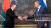 Russian Foreign Minister Sergei Lavrov and his Belarusian counterpart Uladzimer Makey shake hands following talks in Moscow.