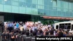 Kazakhstan – A protest organised by unregistered Democratic party of Kazakhstan. Police detain protesters. Almaty, 6 July 2021