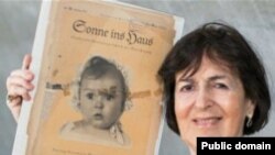 Фотография шестимесячной Хесси Тафт украсила обложку нацистского семейного журнала в Германии. 79 лет спустя выясняется, что девочка, олицетворявшая чистоту арийской расы, на самом деле была еврейкой. 