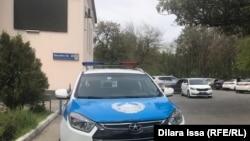 Полиция көлігі. Көрнекі сурет.