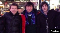 Boston marathon bombing suspect Dzhokhar Tsarnaev (right) poses with Azamat Tazhayakov (left) and Dias Kadyrbaev in an undated photo taken in New York.