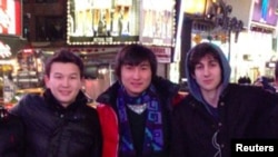 Boston Marathon bomber Dzhokhar Tsarnaev (right) poses with Azamat Tazhayakov (left) and Dias Kadyrbaev in an undated photo taken in New York. 