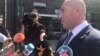 Outgoing Kosovar Prime Minister Ramush Haradinaj speaks to reporters outside a special court in The Hague on July 24. 