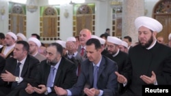 بشار اسد، رییس جمهوری سوریه در جریان مراسم عید فطر