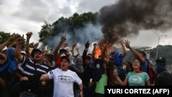 Оппозиционная демонстрация против власти Николаса Мадуро и чавистов. Каракас, 23 января