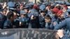 Armenia -- Riot police clash in Yerevan with employees of the Spayka company protesting against the arrest of its chief executive, Davit Ghazarian, April 4, 2019.