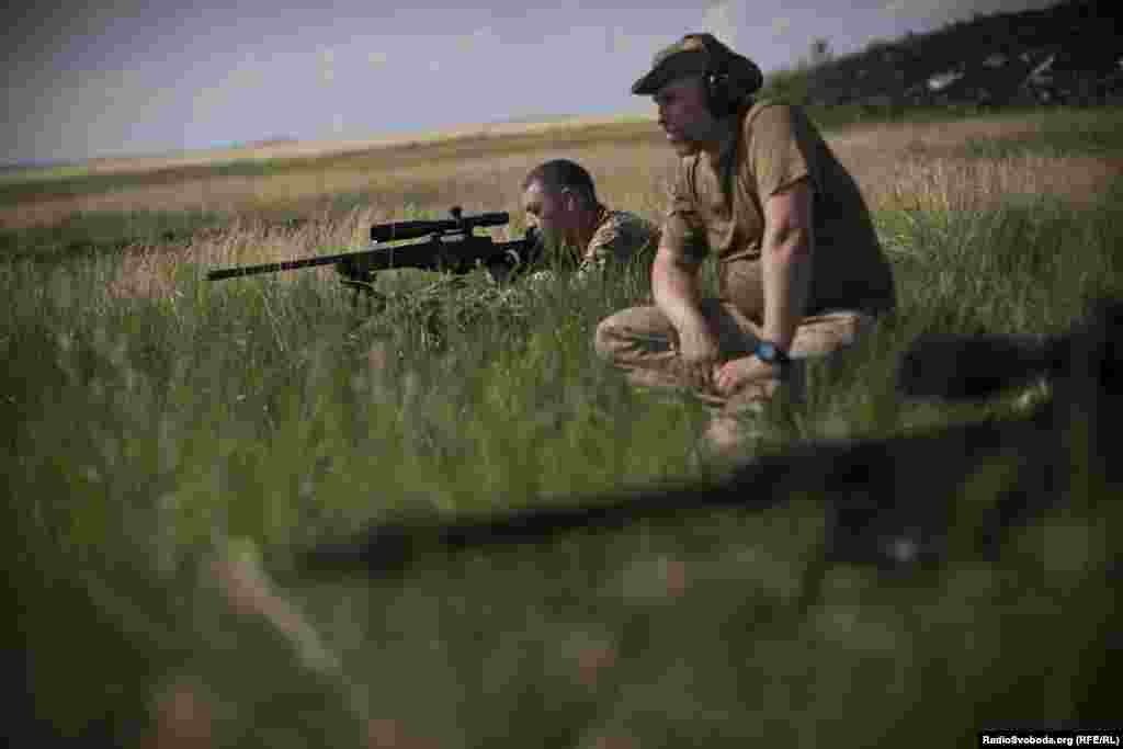 Snipers take part in target practice.