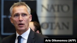 NATO Secretary-General Jens Stoltenberg arrives for a meeting at NATO headquarters in Brussels on June 27.