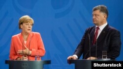 Федеральний канцлер Німеччини Ангела Меркель та президент України Петро Порошенко, архівне фото 