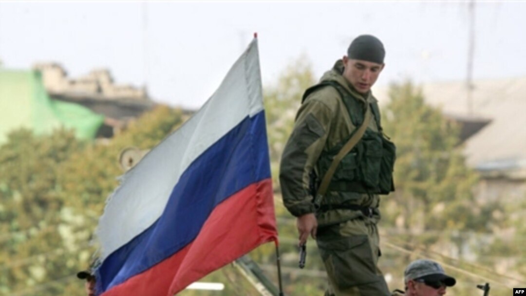 Russian atop a military vehicle in Tskhinvali, the South Ossetian capital, on August 29, 2008