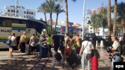 Egypt -- Tourists depart from a hotel in the Red Sea resort of Hurghada, January 9, 2016. 