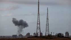 Smoke rises following an Iranian missile strike on southern Israel on March 29. 