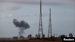 Smoke rises following an Iranian missile strike on southern Israel on March 29. 