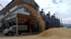 A grain terminal harvests barley in Ukraine's Odesa region. Officials in Kyiv have said they hope grain shipments can resume within the next few days.
