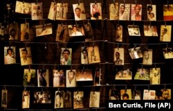 تصاویری شماری از قربانیان نسل‌کشی رواندا در یادواره‌ای در آوریل ۲۰۱۹