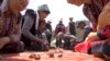 Kyrgyzstan - game of ordo played with sheep's bones - screen grab