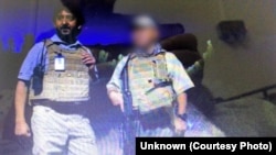 Masood Jamshidi, left, during his service at the US consulate in Herat