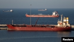 A tanker sits anchored in Muscat, Oman, on March 7.