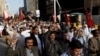 FILE: Journalists chant slogans during a protest rally in the southern city of Karachi in February.