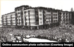 Crowds gather upon Nicolae Ceausescu's arrival in Pitesti, near Bucharest, in 1966. The photo was taken a year after the former shoemaking apprentice rose to power in Romania.