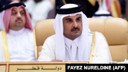 Qatar's Emir Sheikh Tamim bin Hamad al-Thani attends the 4th Summit of Arab States and South American countries on November 11, 2015.