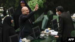 Mohammad Bagher Qalibaf greets members of the parliament after being elected as parliament speaker at the Iranian parliament in Tehran, May 28, 2020