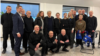 Neki od 250 zatvorenika koje je Belorusija oslobodila 19. marta u okviru sporazuma postignutog sa specijalnim izaslanikom SAD Džonom Koulom (u sredini, zadnji red).