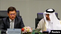 Russian Energy Minister Aleksandr Novak and Saudi ArabianEnergy Minister and OPEC conference president Khalid al-Falih attend a meeting of the Organization of the Petroleum Exporting Countries (OPEC) and non-OPEC producing countries in Vienna, 