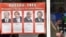 An information bulletin in Minsk with portraits of the four candidates (file photo)