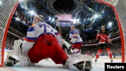 Canada's Ennis Tyler scores against Russia during the ice hockey world championship game in Prague on May 17. 