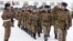 Armenia -- Soldiers march at a military unit.