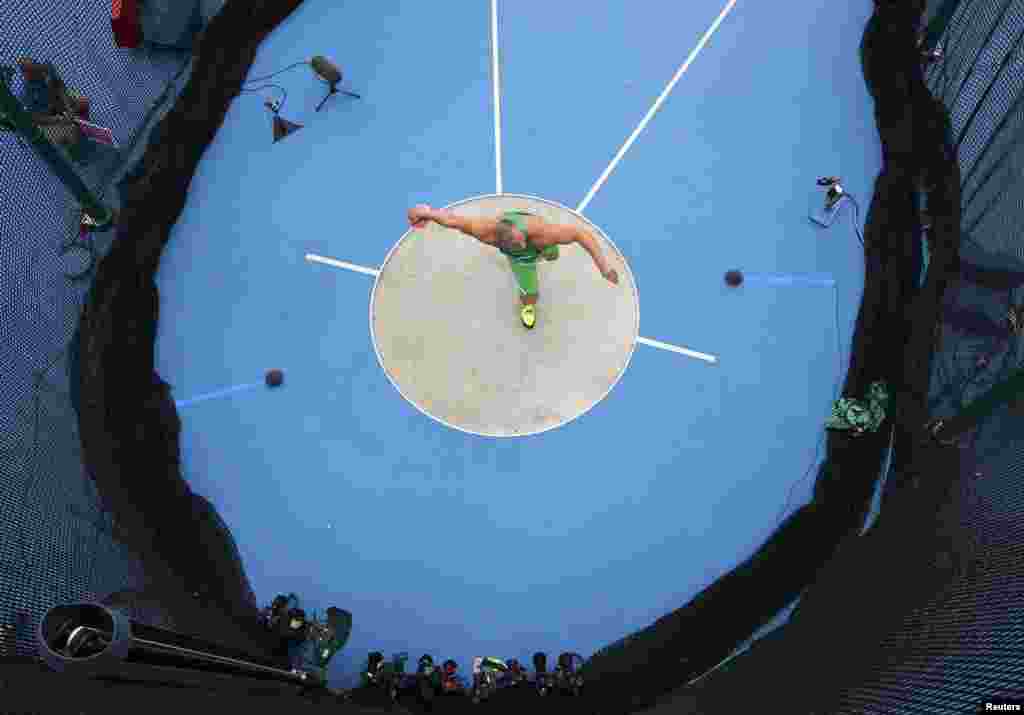 Andrius Gudzius of Lithuania competes in the men&#39;s discus qualifying round.