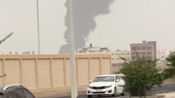 A plume of smoke rises at a refinery in Jizan as Yemen's Iran-backed Houthis said on July 25 that they carried out strikes on targets in Saudi Arabia. 