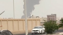 A plume of smoke rises at a refinery in Jizan as Yemen's Iran-backed Houthis said on July 25 that they carried out strikes on targets in Saudi Arabia. 