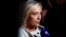 French far-right leader Marine Le Pen talks to journalists on July 7.