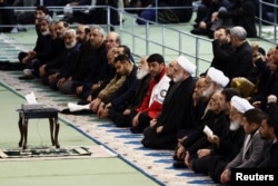 Chief Justice of Iran Gholam Hossein Mohseni Ejei attends Eid al-Fitr prayers, marking the end of Muslim holy fasting month of Ramadan, in Tehran on March 21.