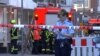 Police block a street near the site where a vehicle drove into a group of people in Muenster Germany, killing two and injuring many. 